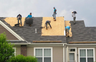 people working on a roof