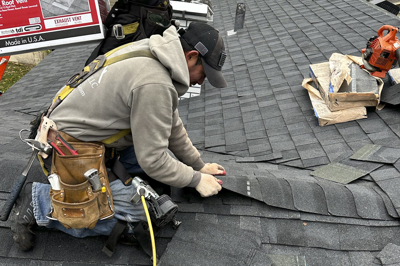 Roof installation team in Alameda CA completing an energy-efficient roof for a coastal home.