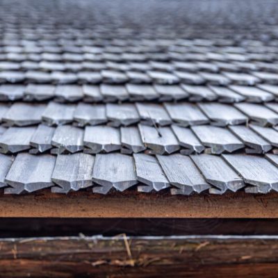 Professional roofing contractors performing roof repair and replacement in Alameda, California homes.