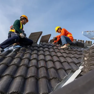 Professional roofing crew in Berkeley, California providing roof repair and replacement services on a residential home with quality materials and craftsmanship.